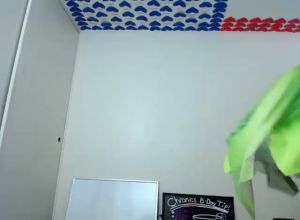 Девушка в костюме бабочки ласкает себя